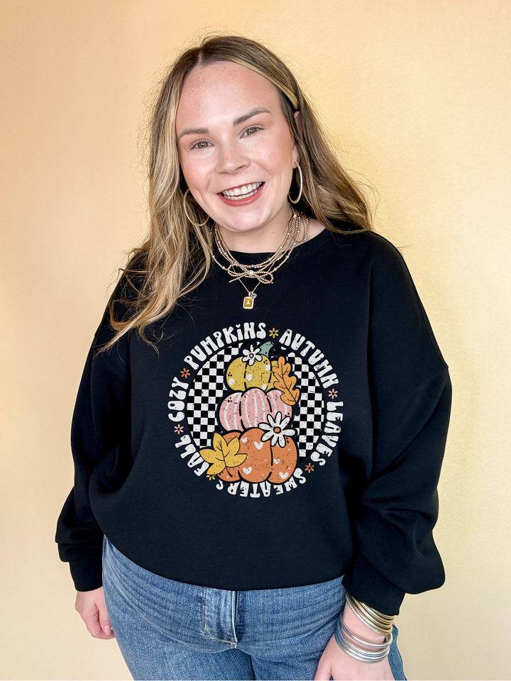 Online Exclusive | Fall Illustrations Graphic Sweatshirt with Three Pumpkins on a Checkered background in Multiple Color Options