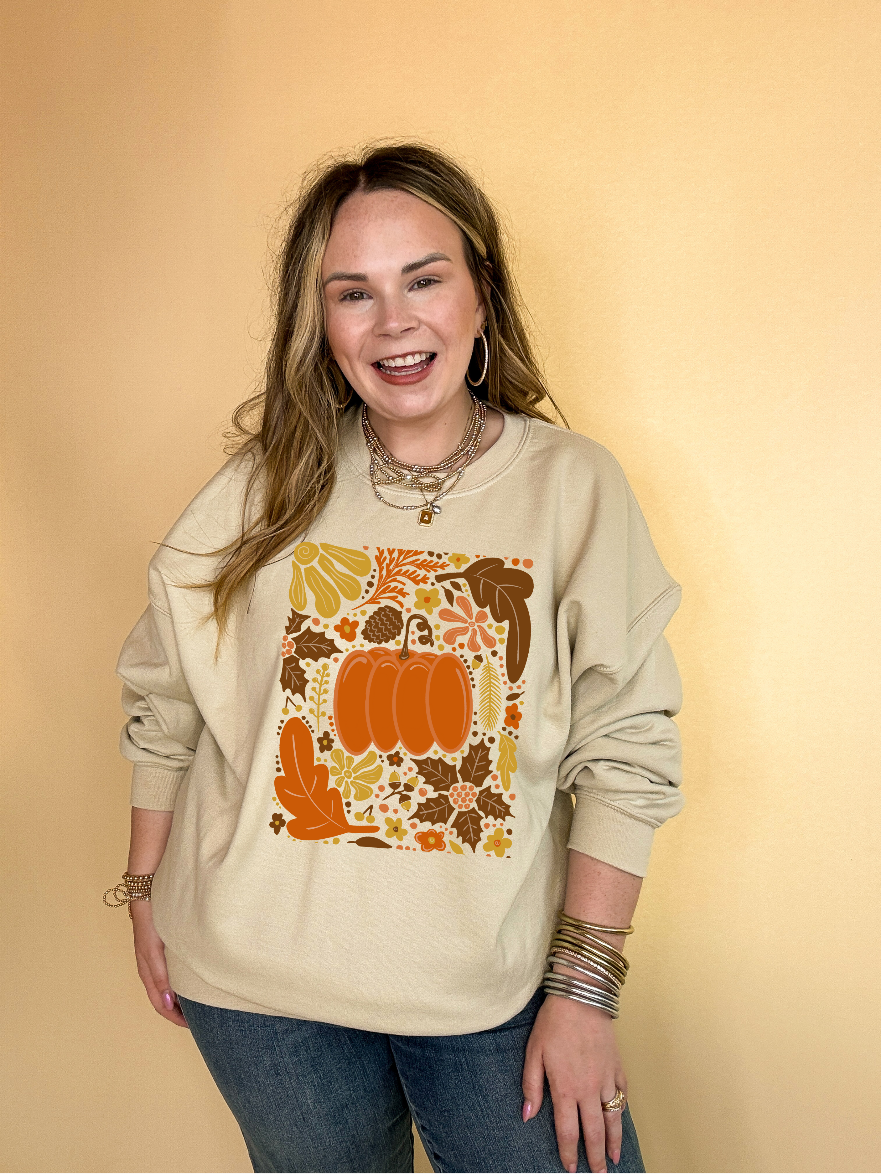 Online Exclusive | Fall Mania Graphic Sweatshirt with Hand drawn Pumpkin and leaves in Multiple Color Options