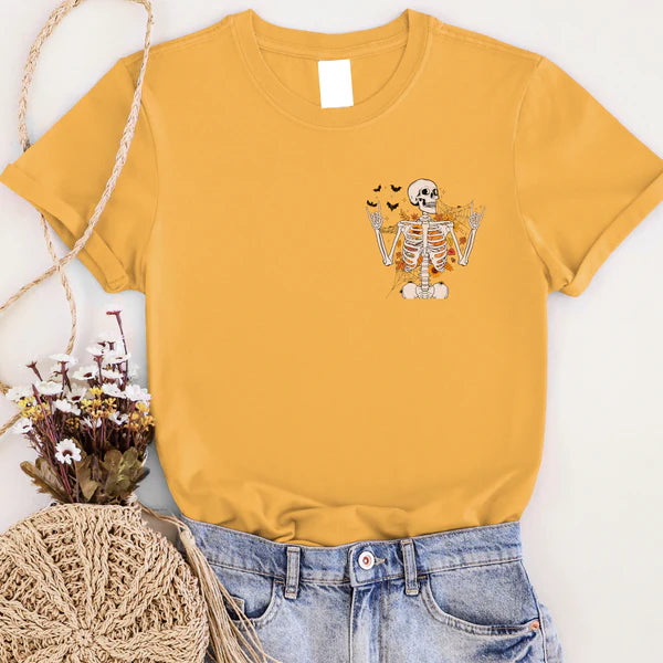 Yellow t-shirt with a skeleton design on a white background