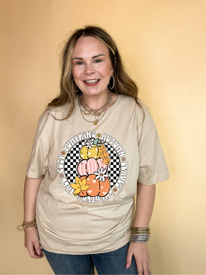 Online Exclusive | Fall Illustrations Graphic Tee with Three Pumpkins on a Checkered background in Multiple Color Options