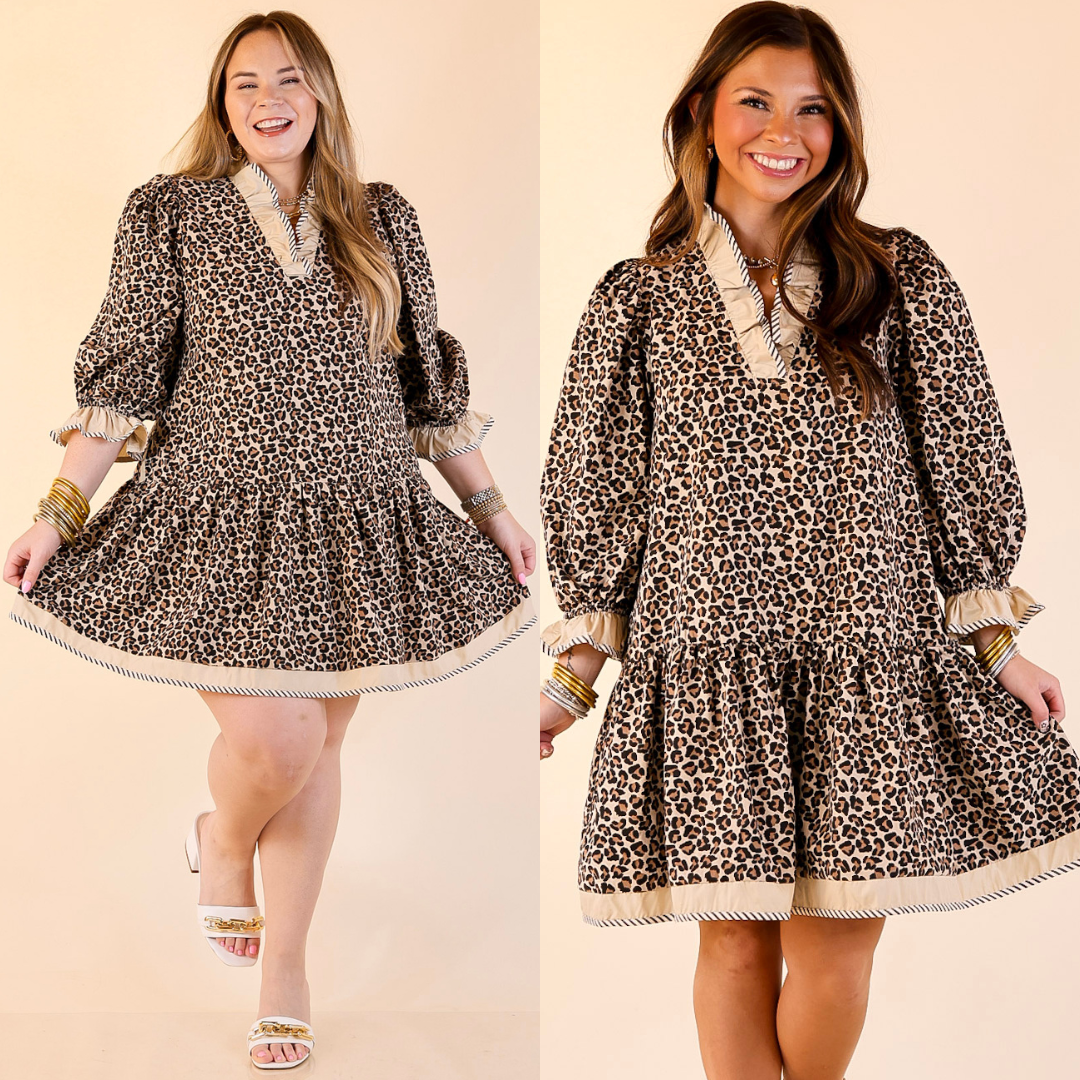 Models are wearing a leopard print dress with long sleeves on a beige background.