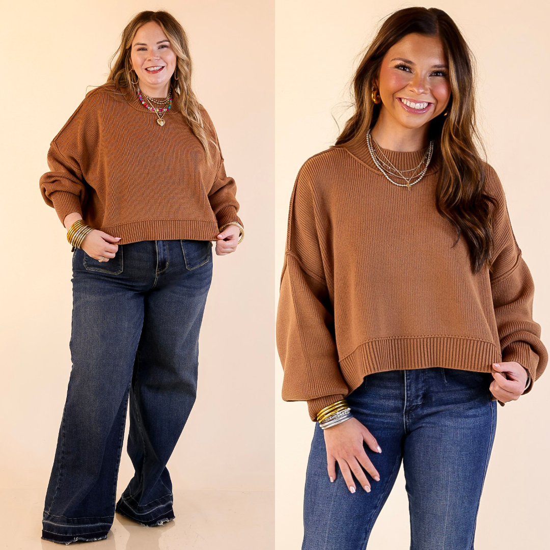 Two models wearing the Camel Brown 'Fireside Fit' cropped long sleeve mock neck sweater with jeans. Against a plain background.