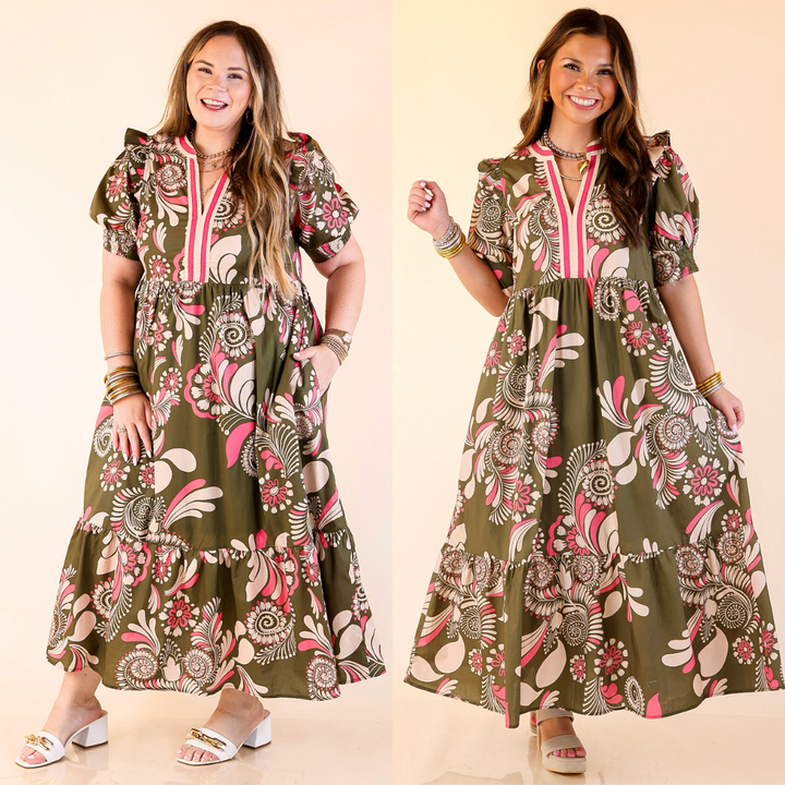 Women modeling olive green and pink mix v-neck midi dress featuring paisley pattern against plain background.