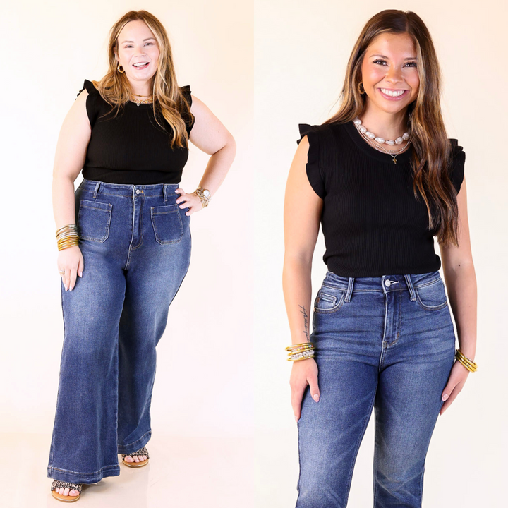 Made from a soft, ribbed fabric, this crew neck cutie features playful ruffled sleeves for just the right touch of charm. Sizes small through large.