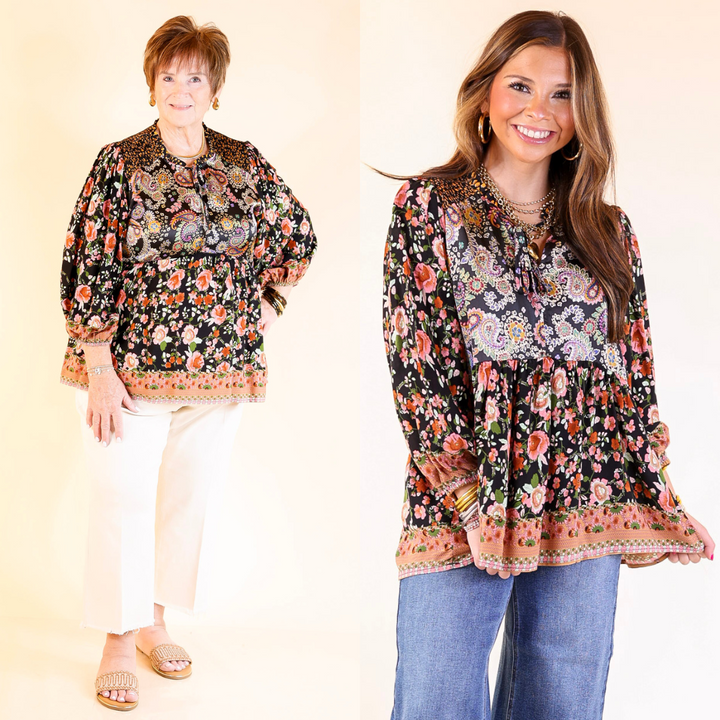 Two women wearing floral patterned tops against a plain background