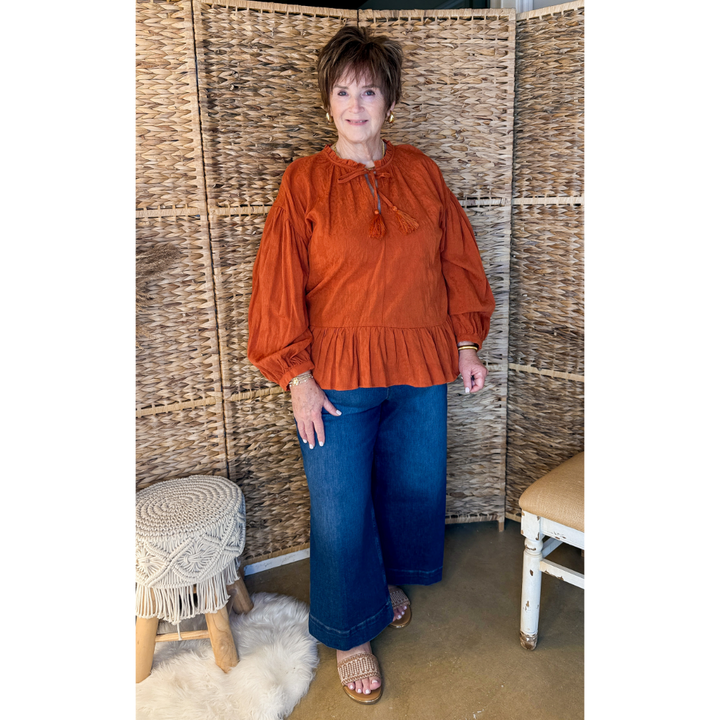 Free Fallin' Textured Long Sleeve Peplum Top with Keyhole Front in Orange