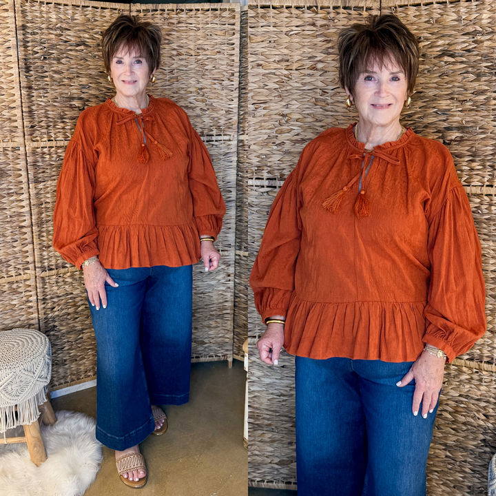 Free Fallin' Textured Long Sleeve Peplum Top with Keyhole Front in Orange