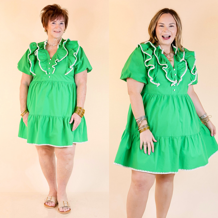 Frill Seeker blends puff sleeves, crochet trim, and ruffles in a breezy A-line dress—timeless charm made easy. Sizes small though large.
