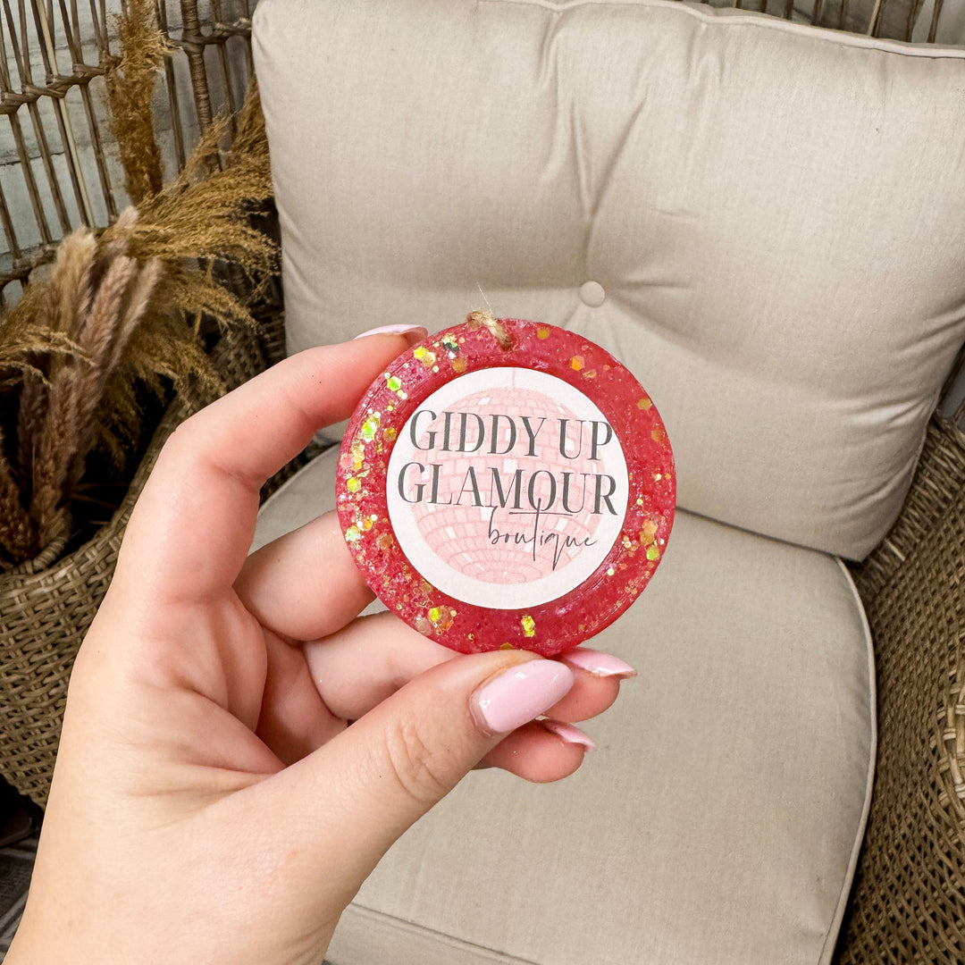 Pink car freshie logo with rustic chain background