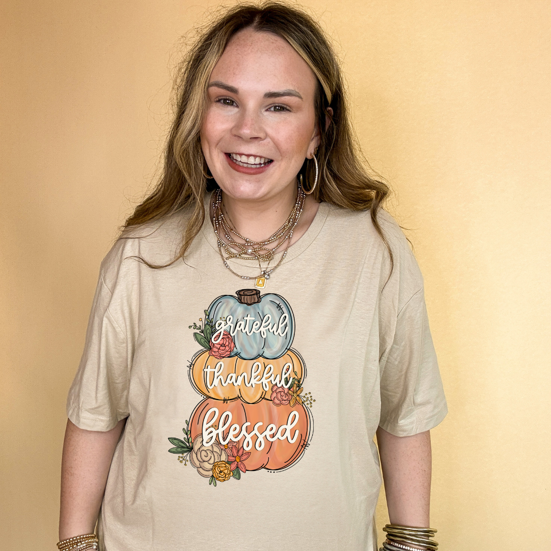 Online Exclusive | Grateful, Thankful, Blessed Stacked Pumpkins and Floral Arrangement Graphic Tee in Multiple Color Options