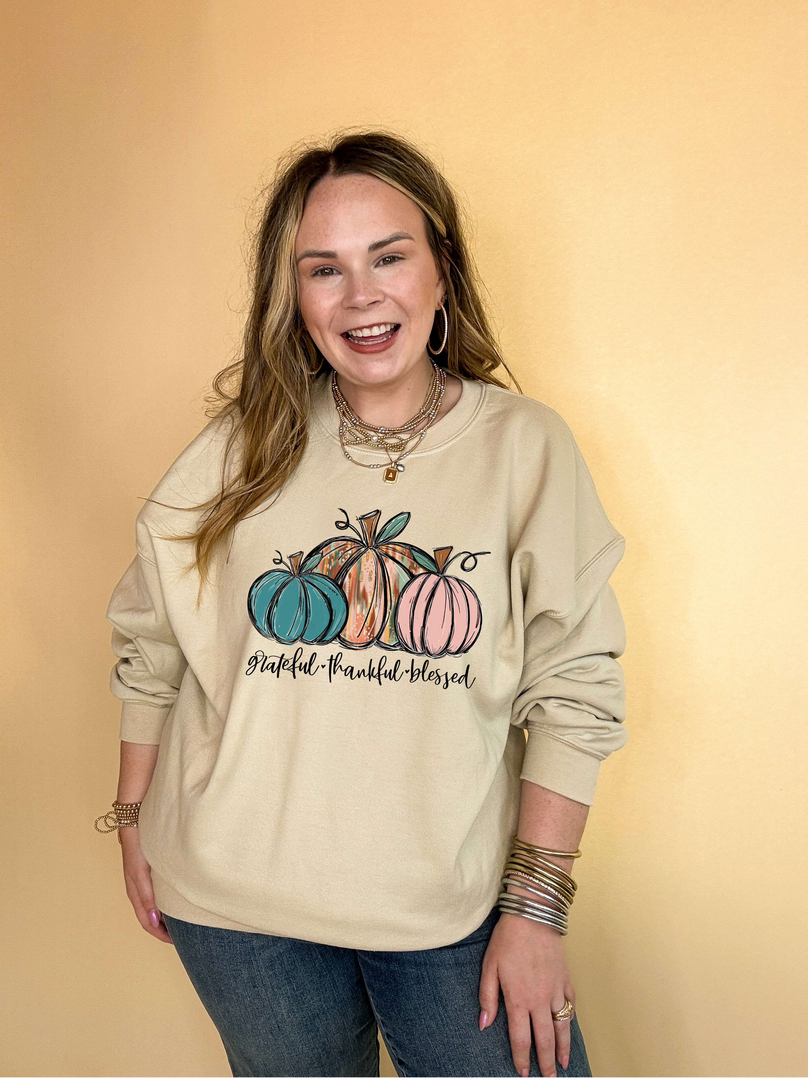 Online Exclusive | Grateful, Thankful and Blessed Three Painted Pumpkin Graphic Sweatshirt in Multiple Color Options