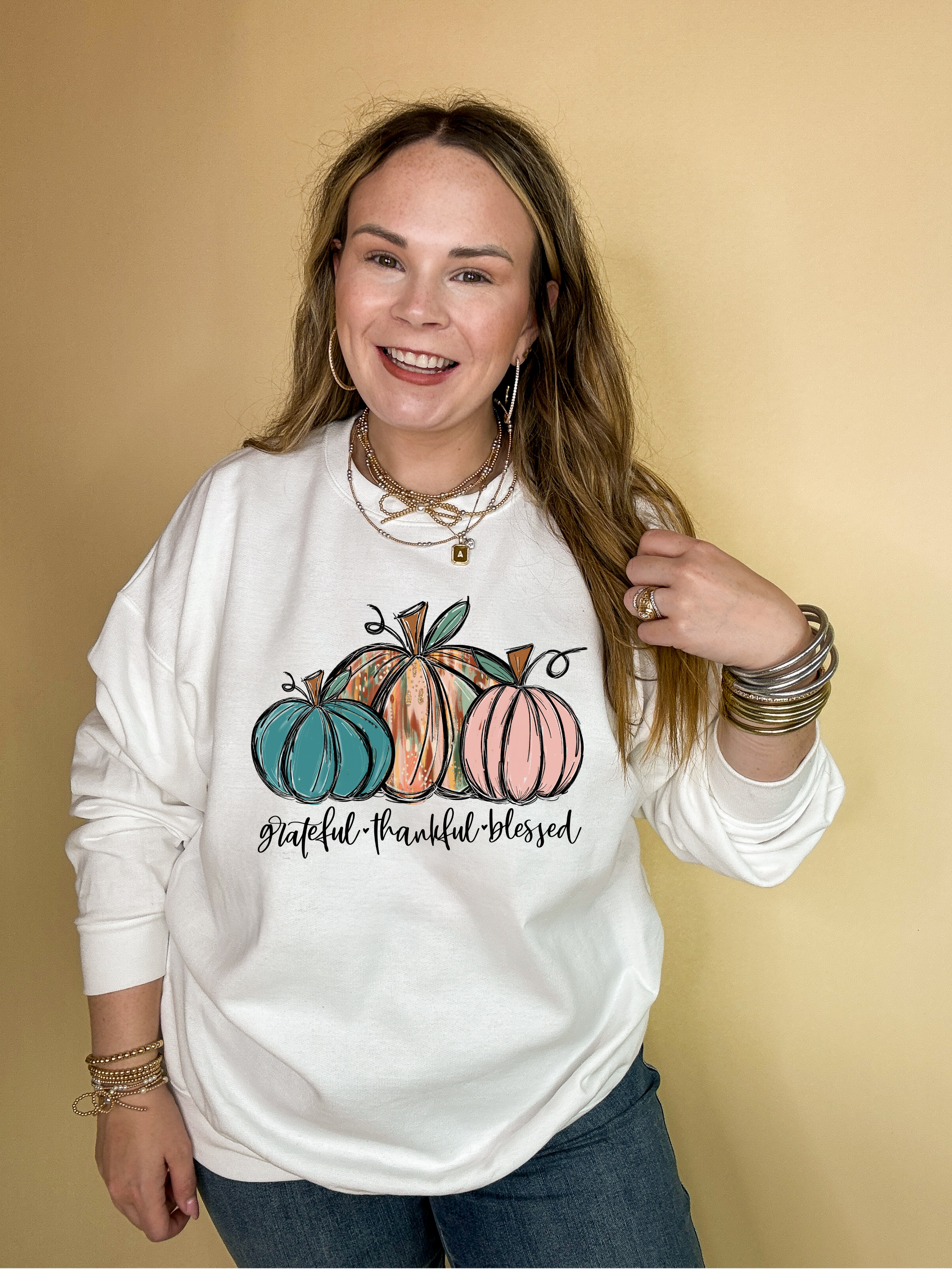 Online Exclusive | Grateful, Thankful and Blessed Three Painted Pumpkin Graphic Sweatshirt in Multiple Color Options