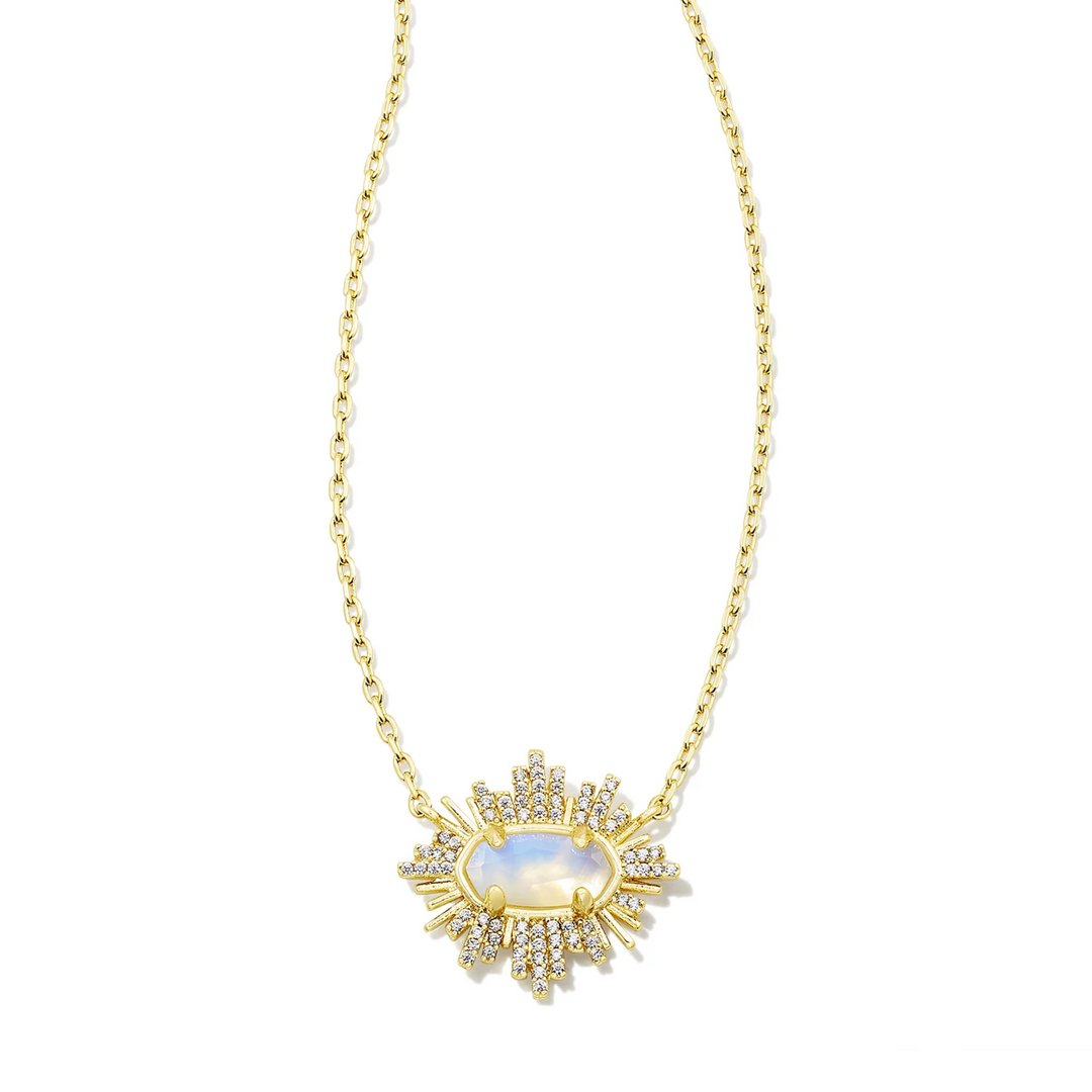 This grayson Sunburst Gold Frame Pendant Necklace in Iridescent Opalite illusion by Kendra Scott is pictured on a white background.