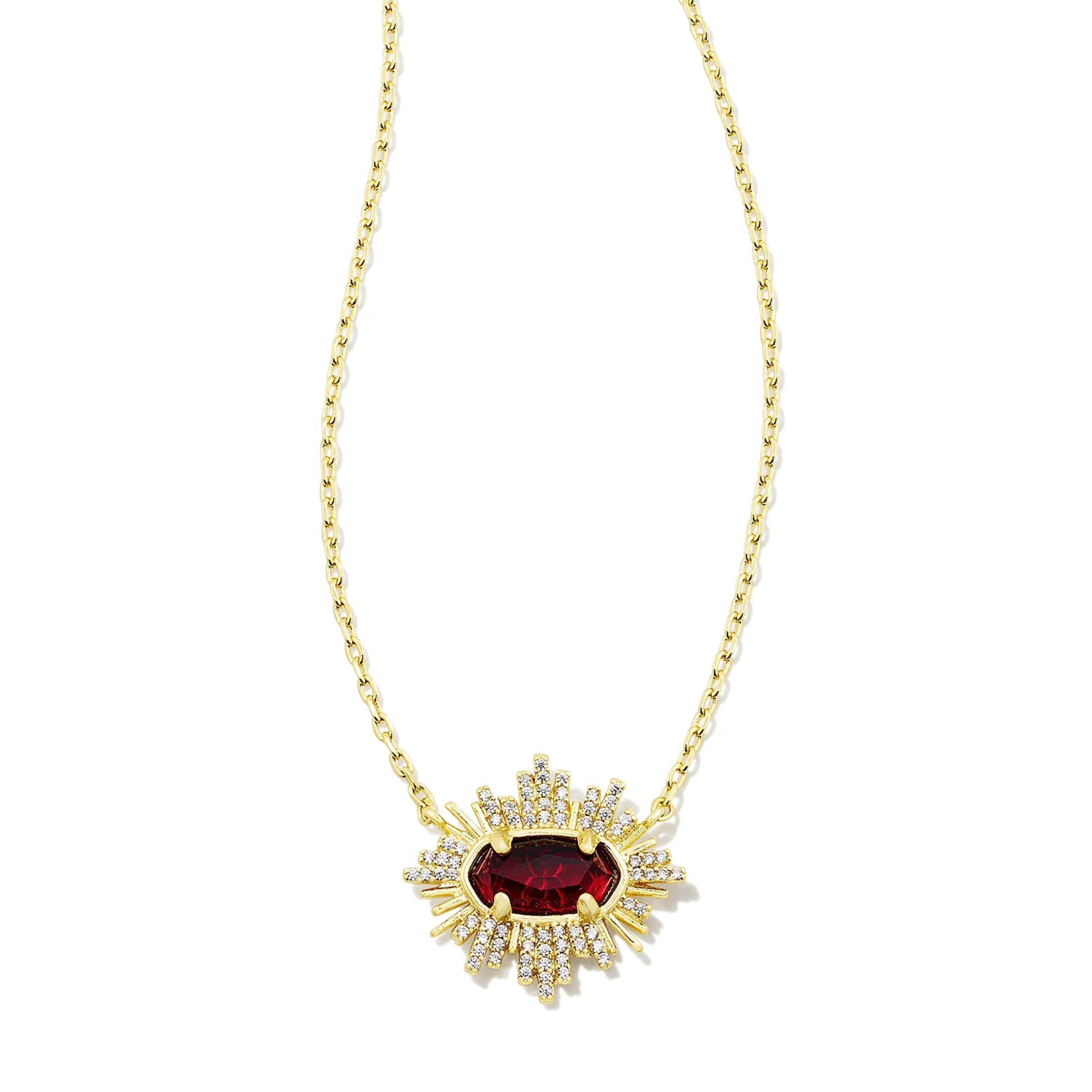 This Grayson Sunburst Gold Frame Pendent in Red Glass by Kendra Scott is pictured on a white background.