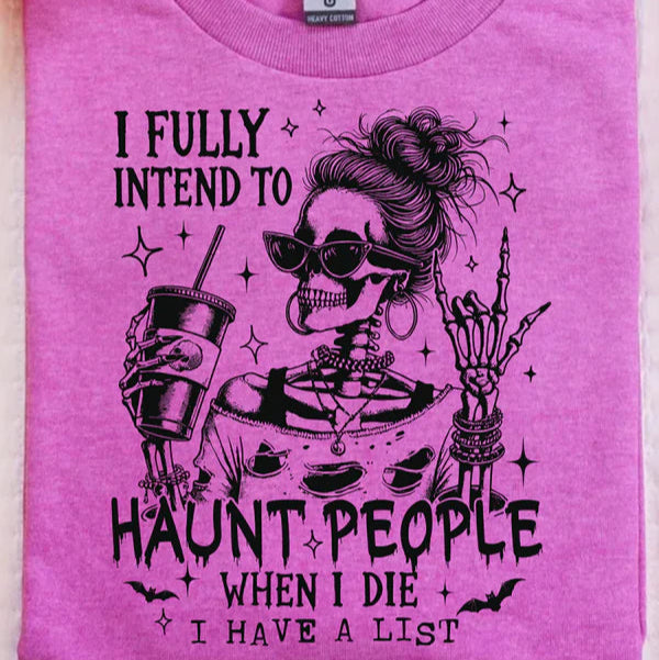 Pink t-shirt with a skeleton design and text on a white background