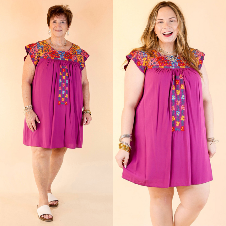 This dress includes a scoop neckline, ruffle cap sleeves, and an embroidered upper. Dress is lined. Available in sizes small through plus size.