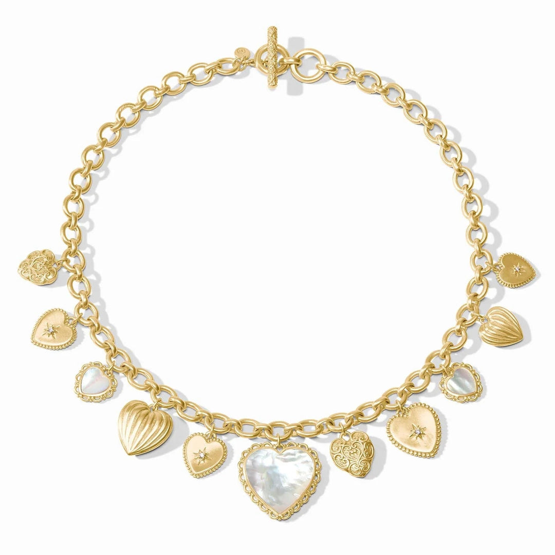 Gold necklace with heart-shaped charms on a white background