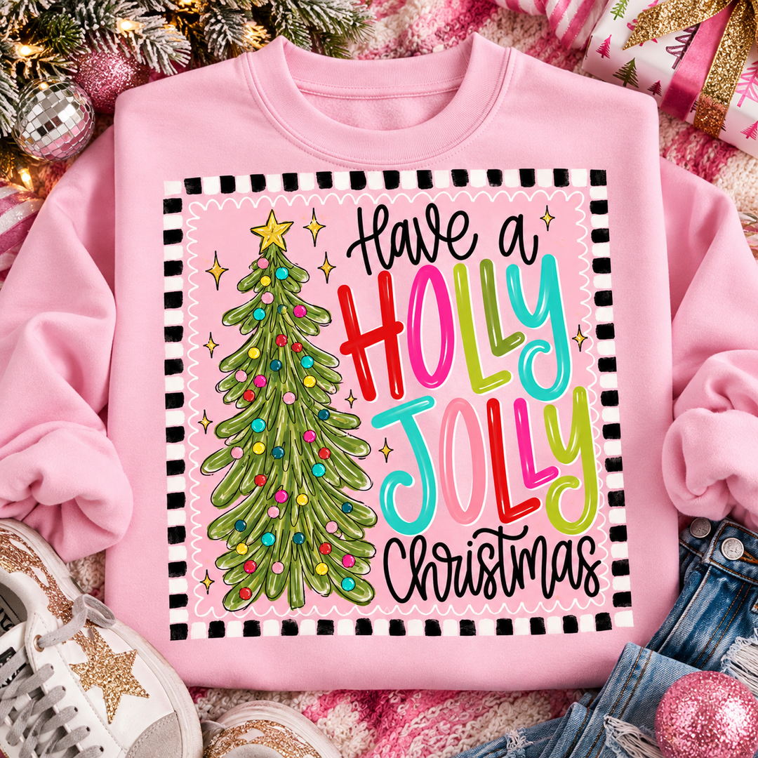 Holly Jolly Tree Christmas graphic tee or sweatshirt on light pink with Have a Holly Jolly Christmas script with a Christmas tree and checkered border