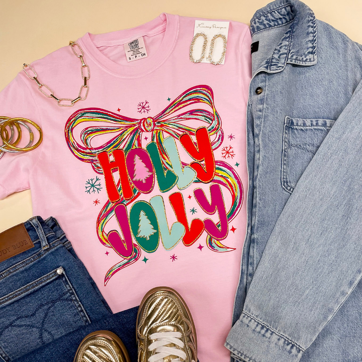 Last Chance Size 3XL | Holly Jolly Colorful Bow Christmas Graphic on Short Sleeve Comfort Color Tee in Pink - Giddy Up Glamour Boutique