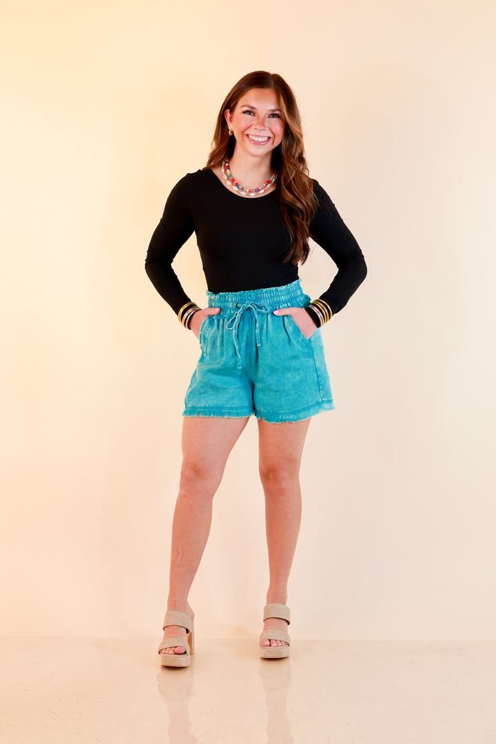 Sunny State of Mind Drawstring Acid Wash Shorts with Fray Hem in Turquoise Blue