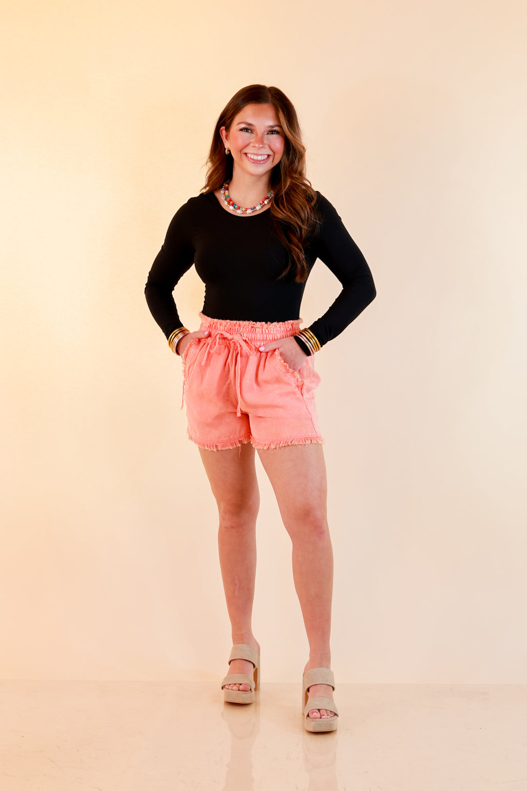 Sunny State of Mind Drawstring Acid Wash Shorts with Fray Hem in Coral Orange