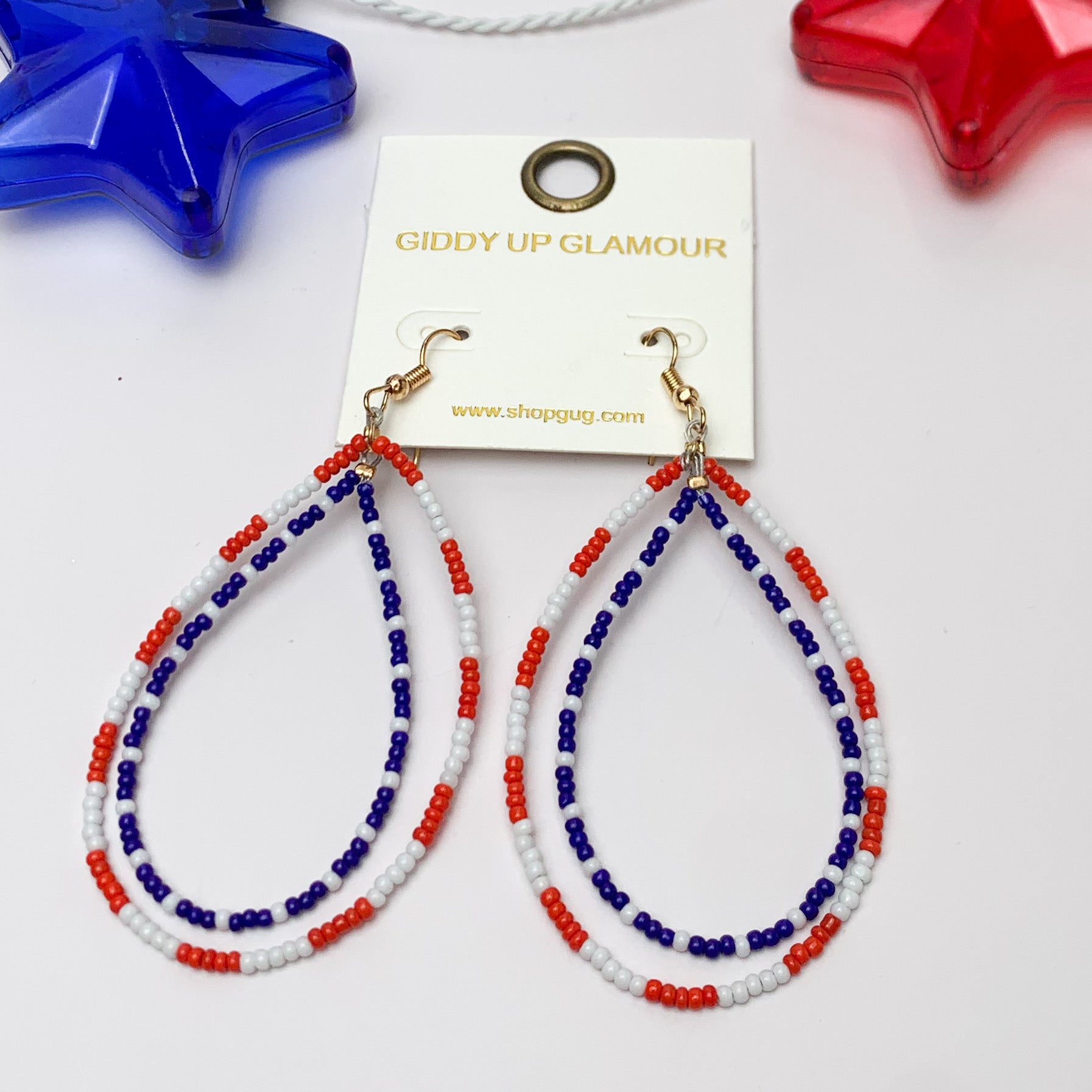 Red, White, and Beads USA Double Open Teardrop Earrings. Pictured on a white background with a blue and red star at the top for decoration.
