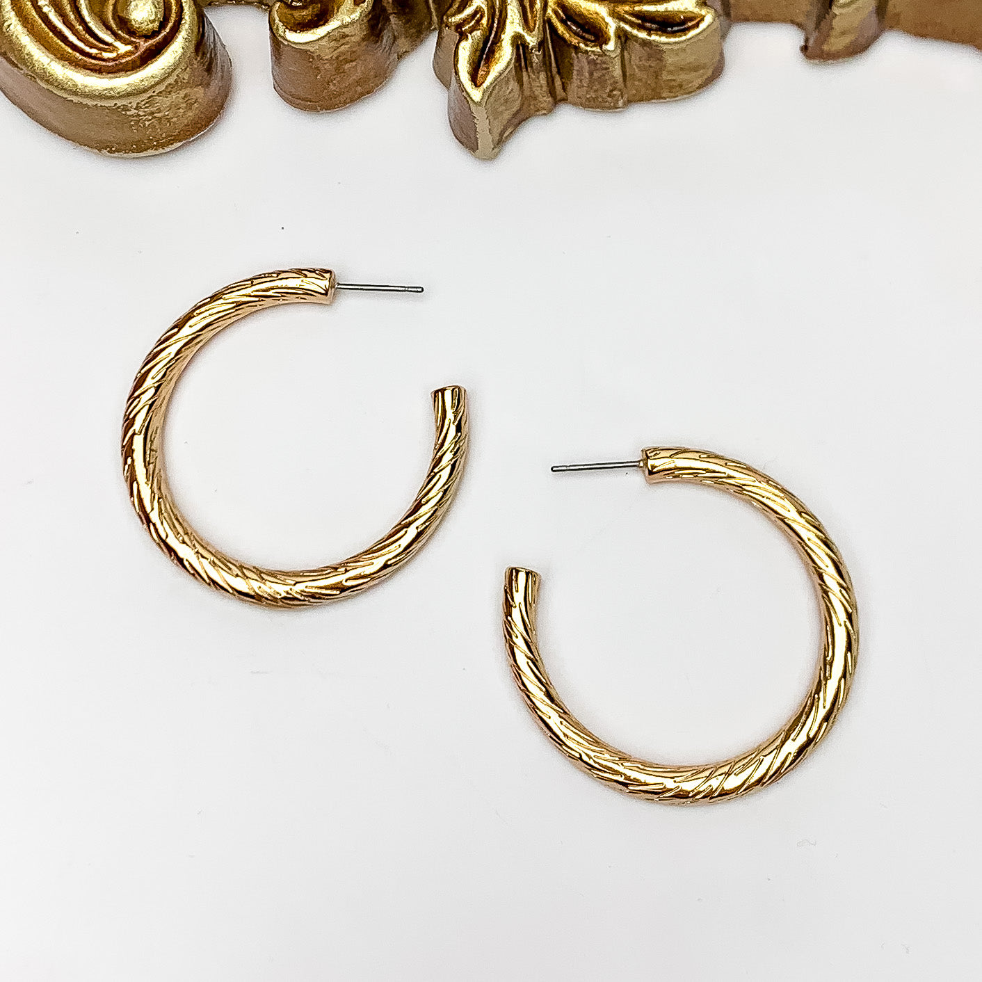 Gold Tone Large Twisted Hoop Earrings - Giddy Up Glamour Boutique