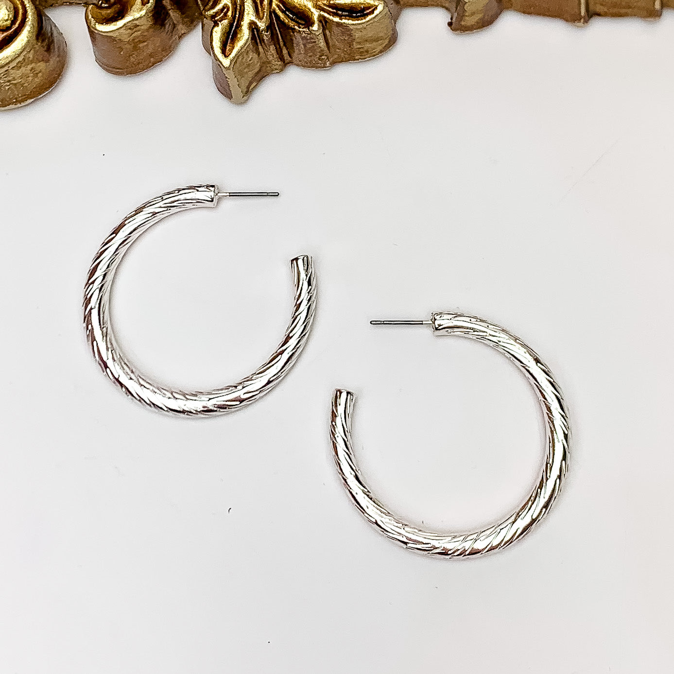 Silver Tone Large Twisted Hoop Earrings - Giddy Up Glamour Boutique
