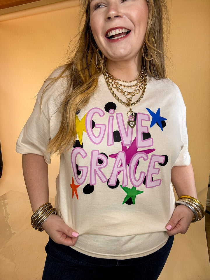 Grace Upon Grace "Give Grace" Distressed Polka Dot and Star Print Short Sleeve Graphic Tee in Natural