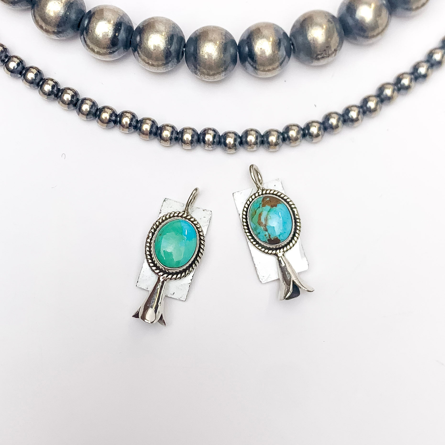 HaDa Collections | Sterling Silver Squash Blossom Pendant with Kingman Turquoise Stone