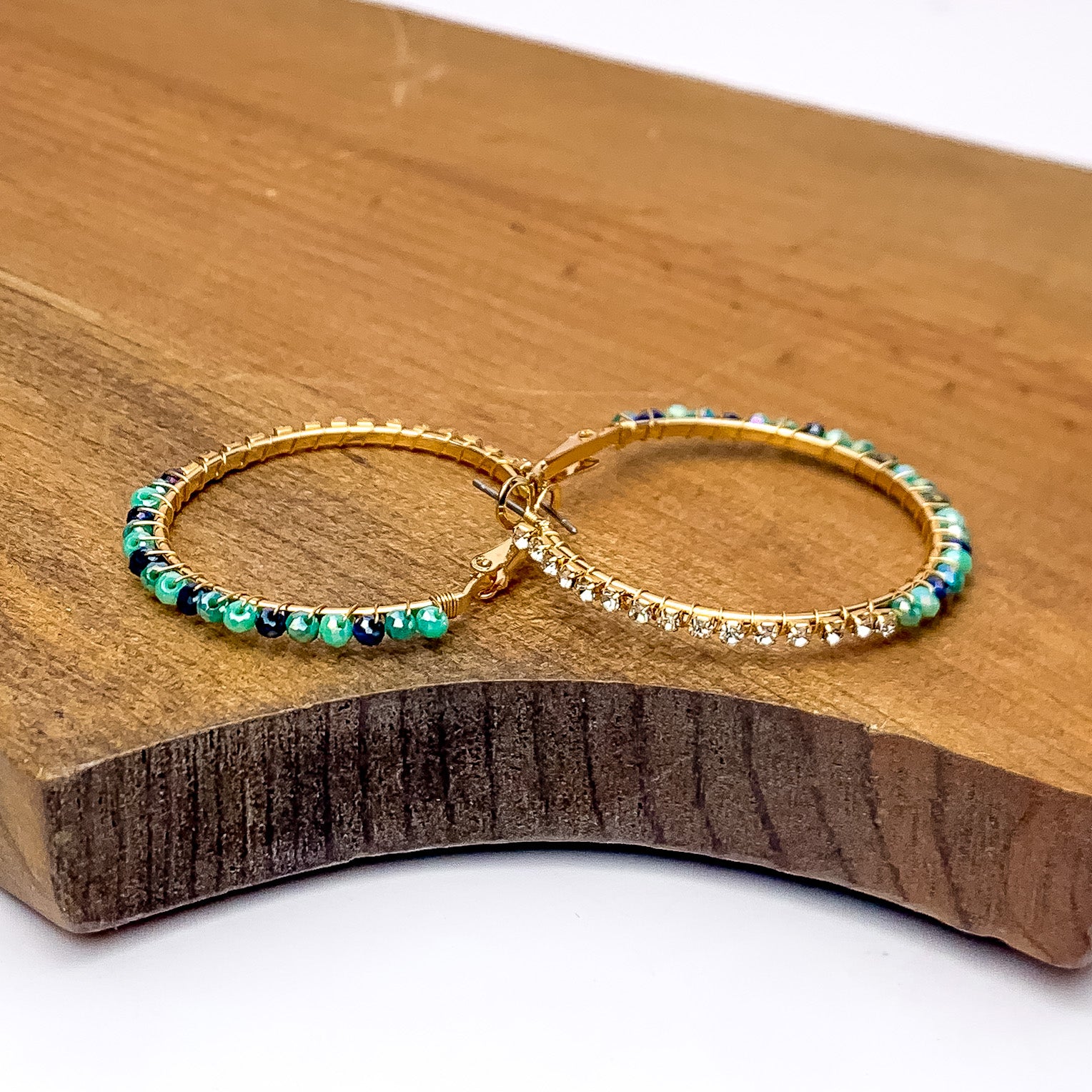 Gold Tone Hoop Earrings Wrapped in Clear and Blue Crystals - Giddy Up Glamour Boutique