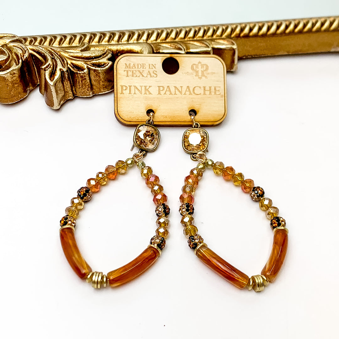 Pink Panache | Golden Shadow Cushion Cut Crystal Earrings with a Tortoise Print Bamboo Tube and Brown Beaded Teardrop - Giddy Up Glamour Boutique