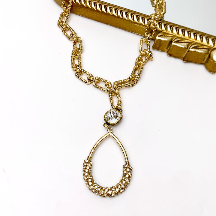 Pink Panache | Hammered Gold Tone Chain Necklace with a Clear Cushion Crystal and Gold Teardrop Pendant Wrapped in Clear Crystals - Giddy Up Glamour Boutique