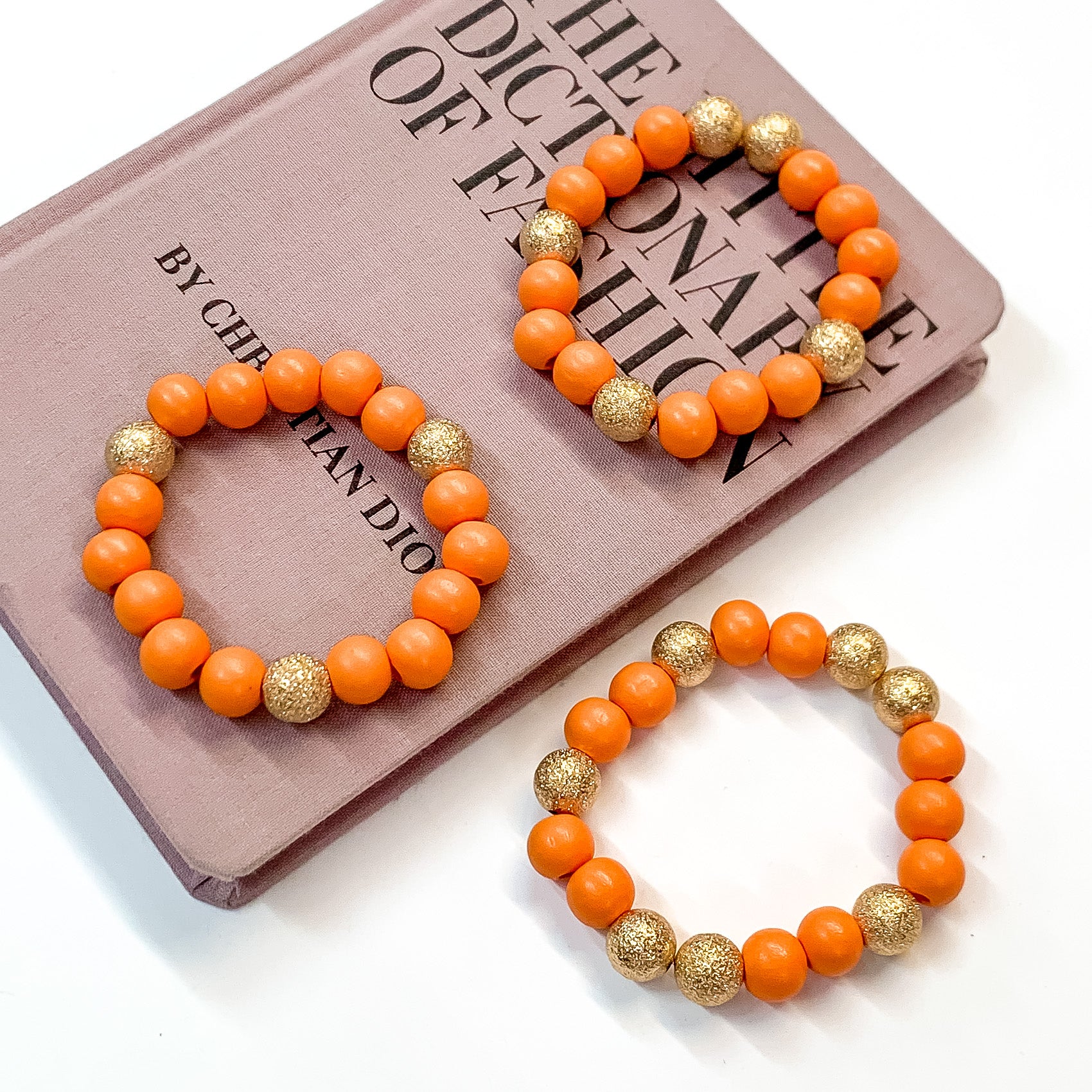 Set of Three | Making Joy Beaded Bracelets with Gold Tone Spacers in Orange - Giddy Up Glamour Boutique