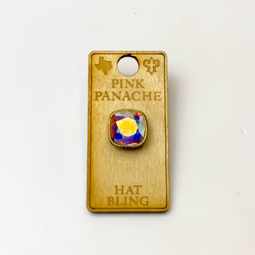 Bronze, square hat pin with an ab cushion cut crystal. This hat pin is pictured on a wooden Pink Panache holder on a white background.