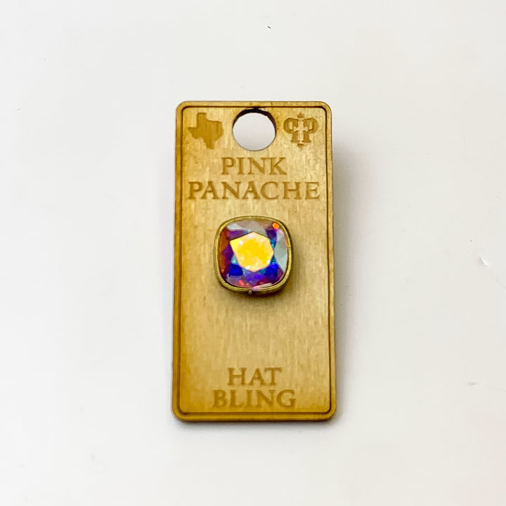 Bronze, square hat pin with an ab cushion cut crystal. This hat pin is pictured on a wooden Pink Panache holder on a white background.