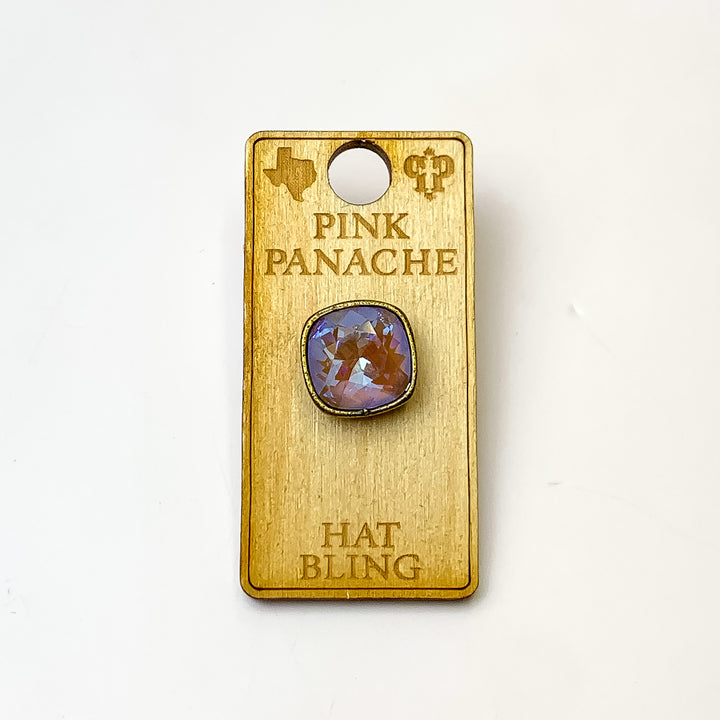 Bronze, square hat pin with a cappuccino delight cushion cut crystal. This hat pin is pictured on a wooden Pink Panache holder on a white background.