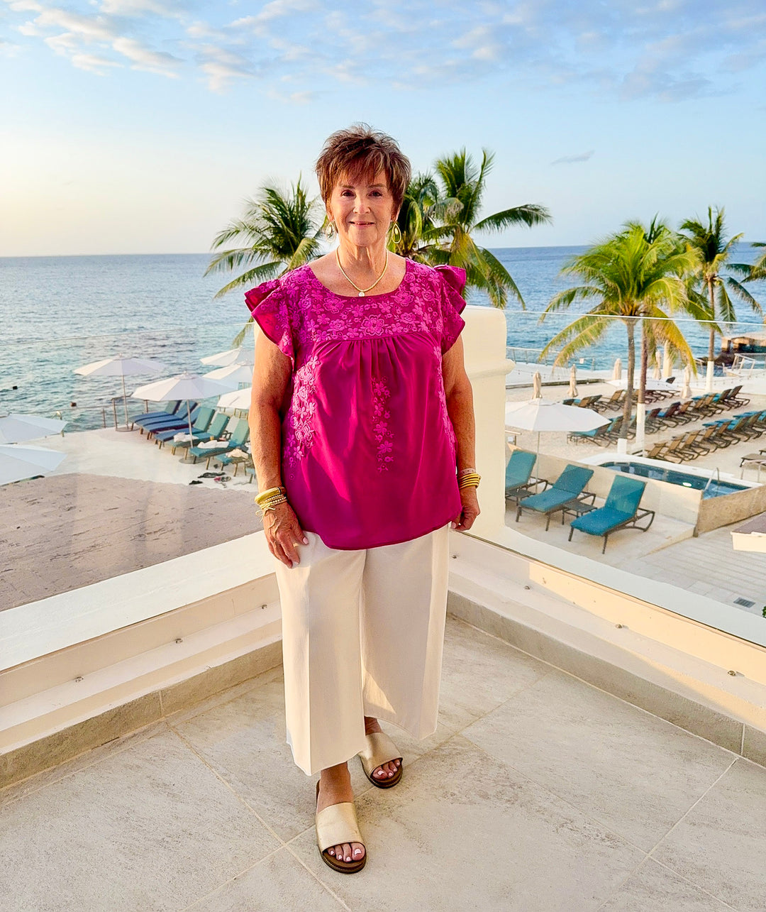 Picture Perfect Ruffle Cap Sleeve Top with Floral Embroidery in Magenta