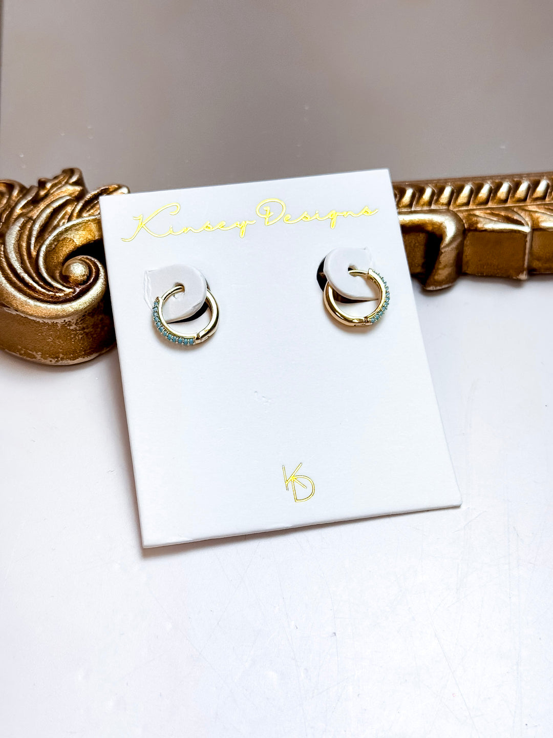Kinsey Designs | Miles Huggie Hoop Earrings in Gold with Turquoise Colored Stones
