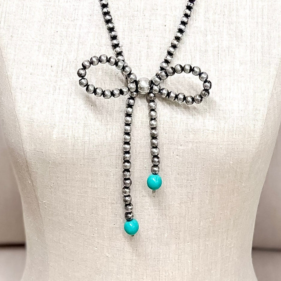 Oh My Bow Silver Beaded Bow Necklace with Turquoise Accents
