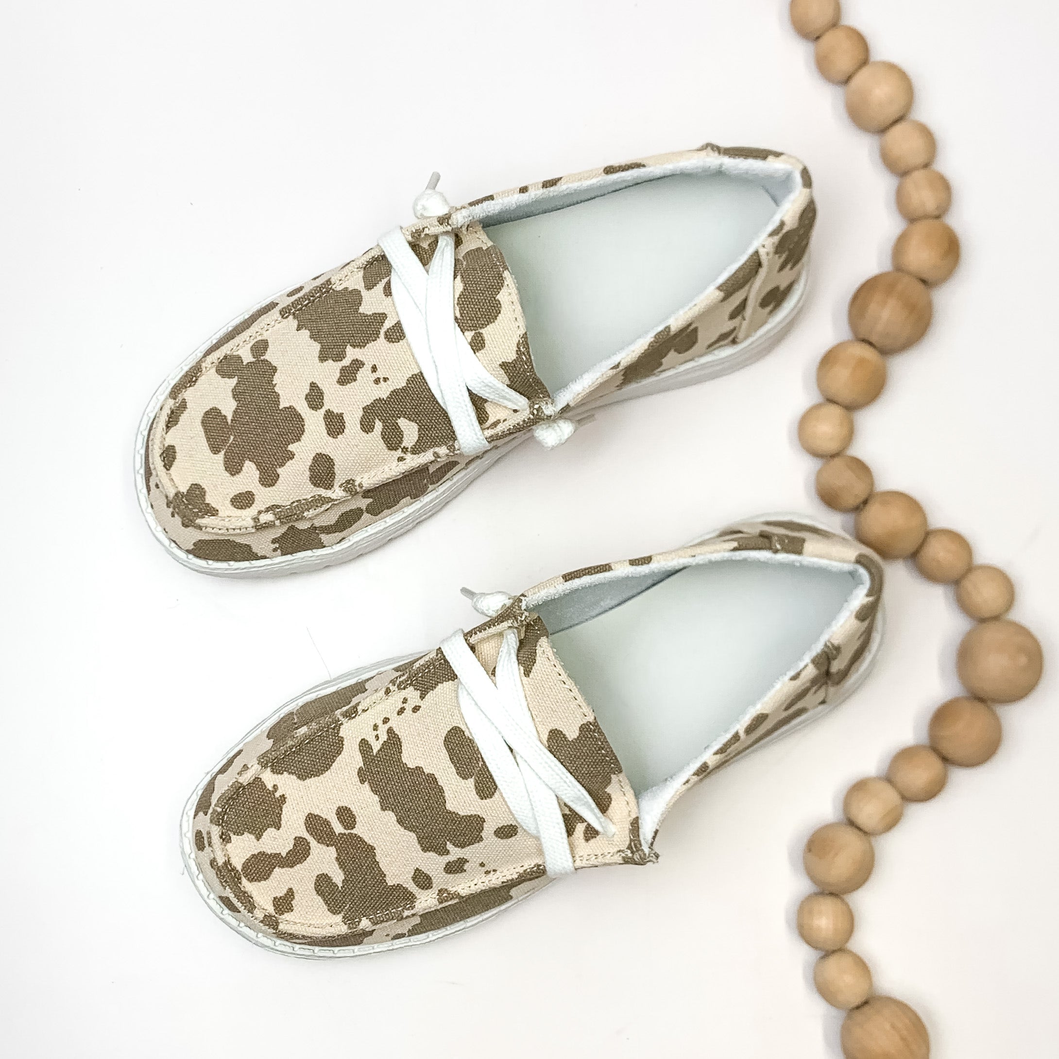 Very G | Have To Run Cow Print Slip On Loafers with Laces in Tan - Giddy Up Glamour Boutique