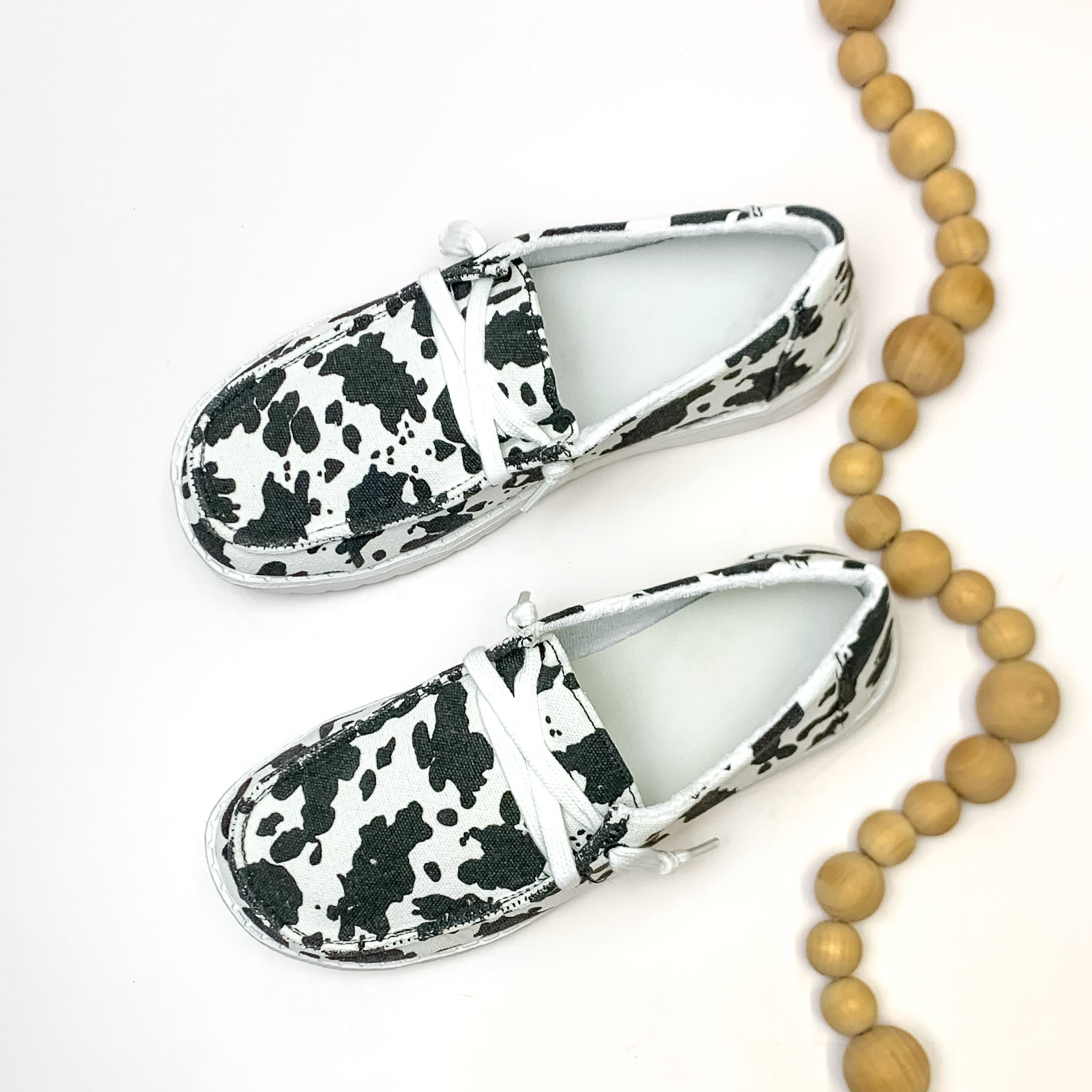 Very G | Have To Run Cow Print Slip On Loafers with Laces in Black - Giddy Up Glamour Boutique