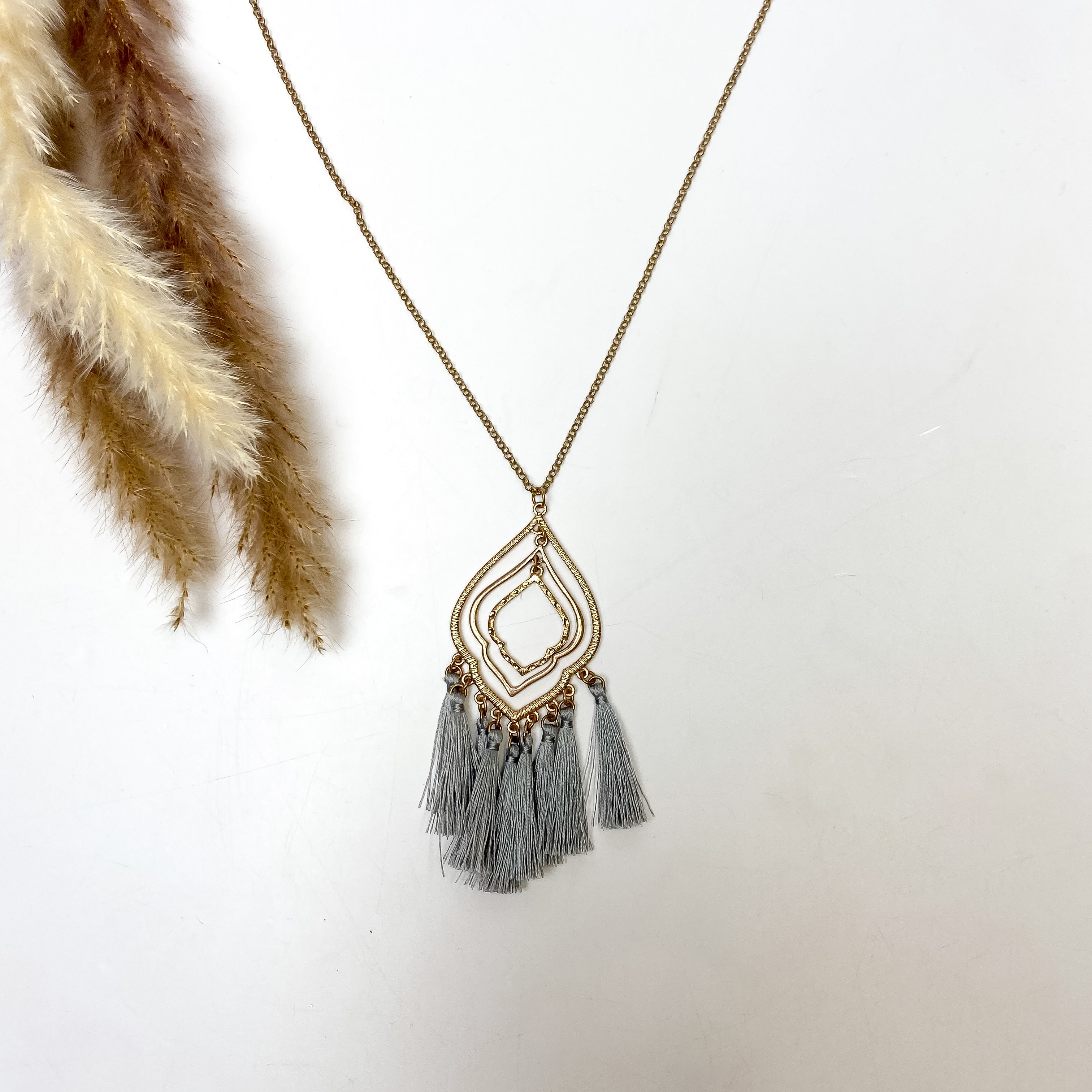 Three Layer Gold Tone Quatrefoil Pendant Necklace with Tassels in Slate Gray