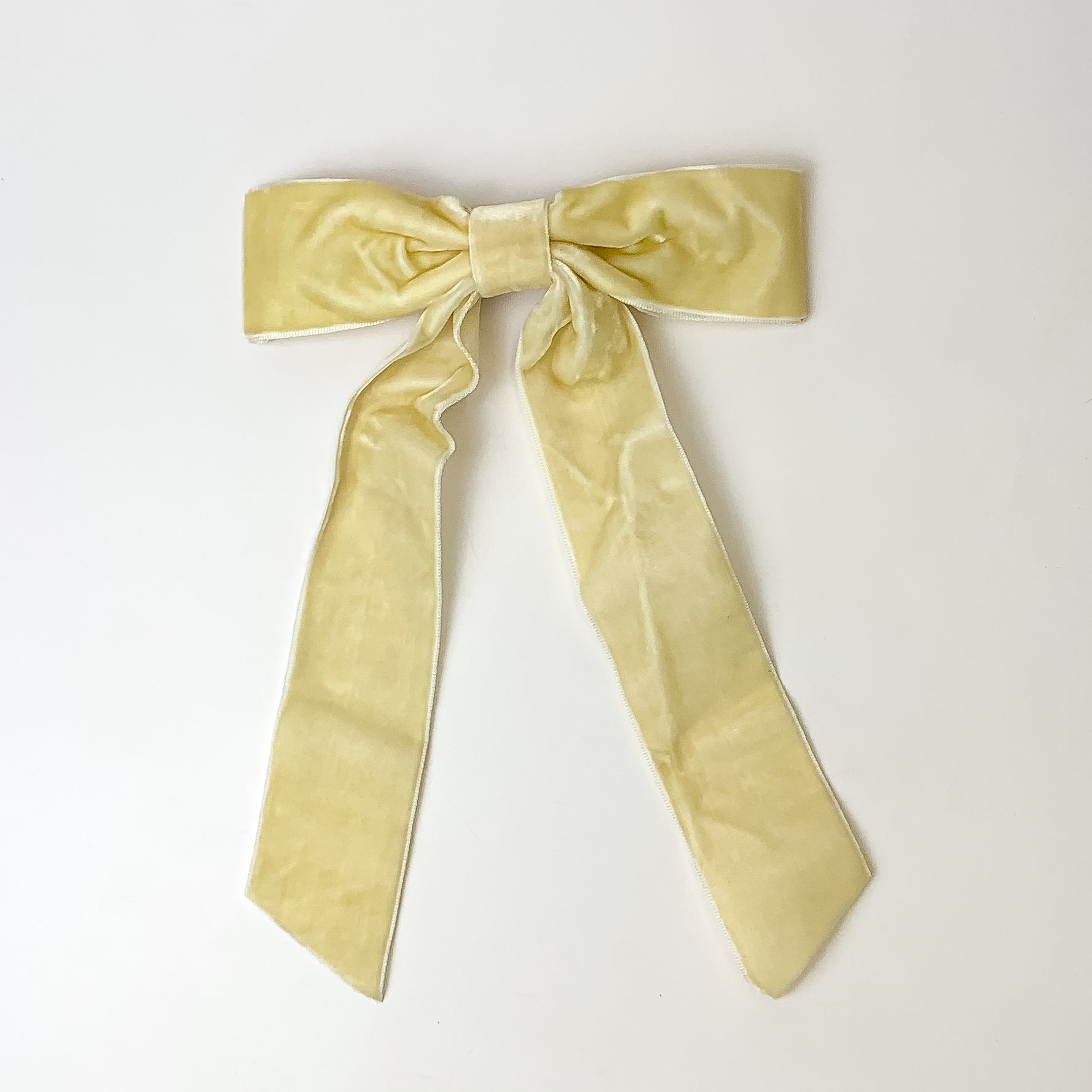 This beautiful cream bow is taken with a white background.