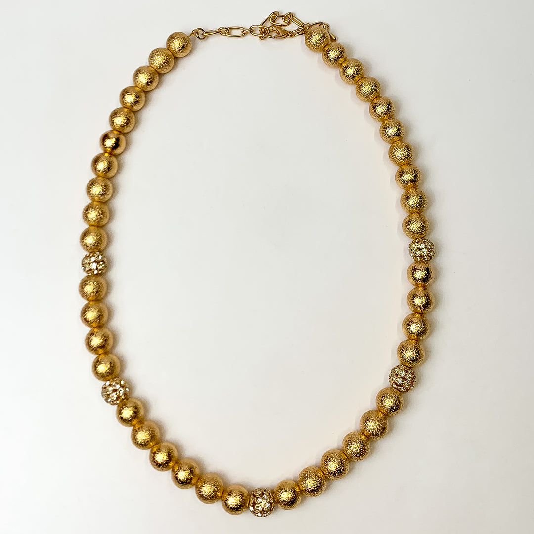 This Gold Tone Necklace with Rhinestone Spacers is pictured on a white background.