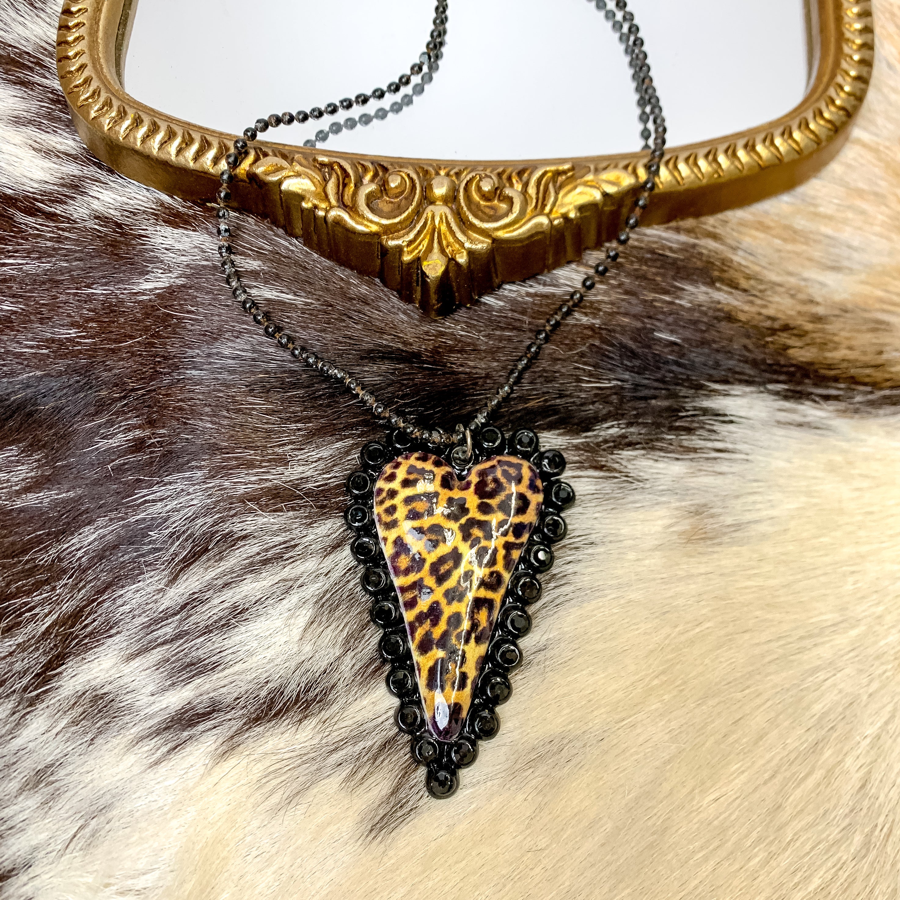 Black Beaded Necklace With Leopard Print Heart Pendant and Black Crystal Border Accents