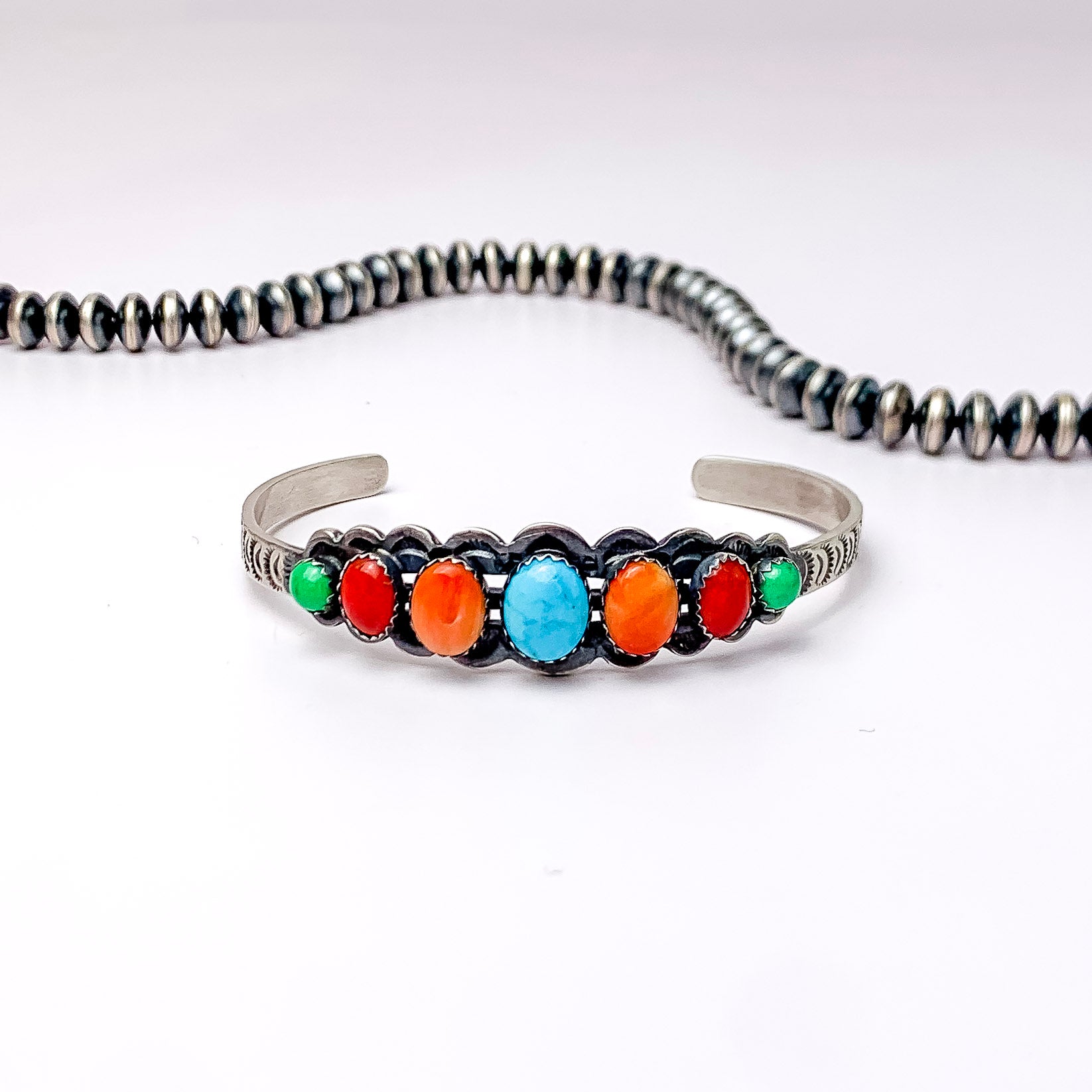 Russell Sam | Detailed Sterling Silver Cuff with Seven Multi-Colored Turquoise Stones - Giddy Up Glamour Boutique