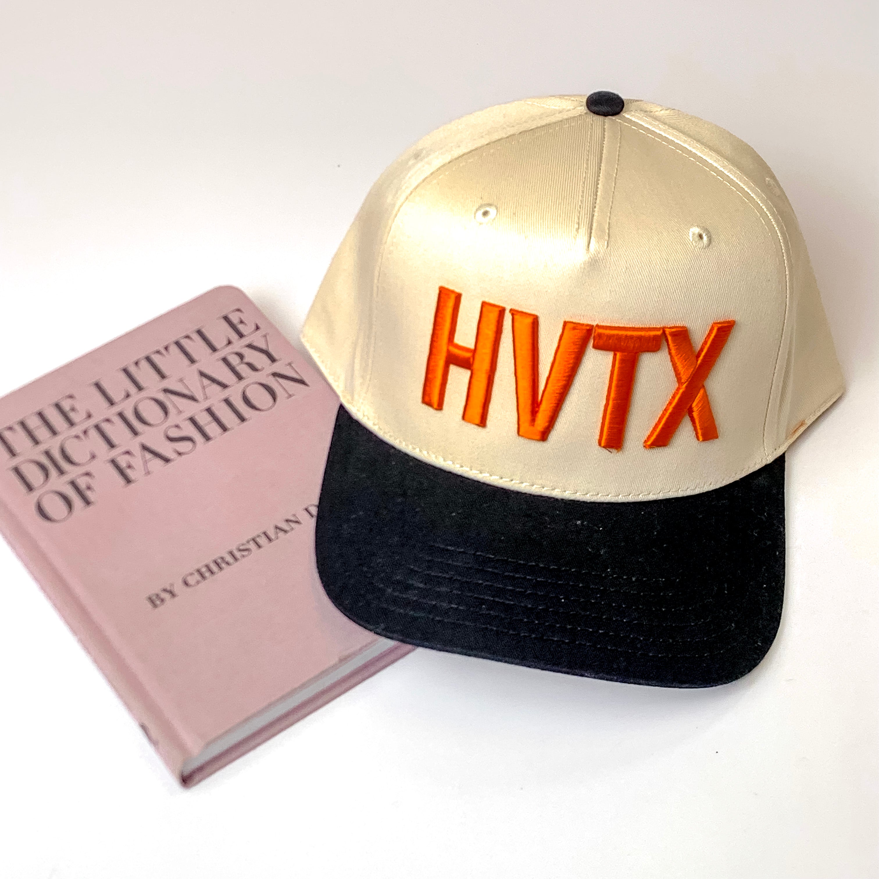 HVTX Cream and Black Trucker Hat with Orange Embroidered Puff Lettering - Giddy Up Glamour Boutique