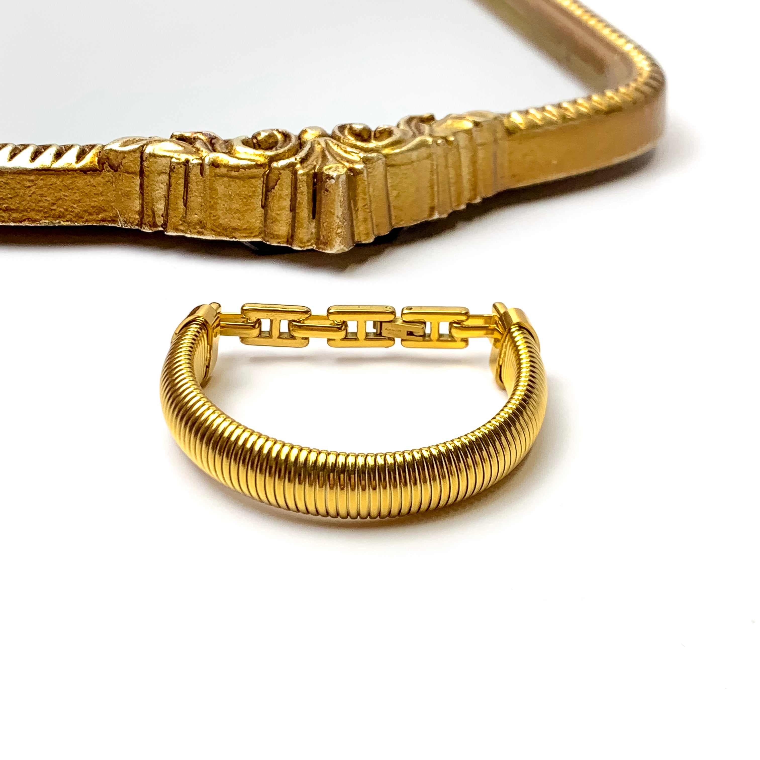 Bracha | She's Unbreakable Single Bracelet in Gold Tone - Giddy Up Glamour Boutique