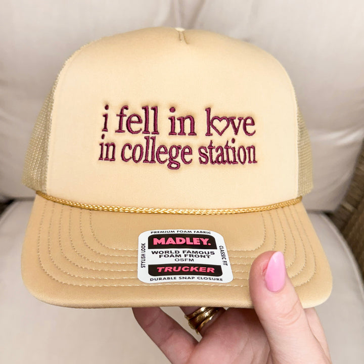 I Fell in Love in College Station Mesh Trucker Hat in Tan and Maroon